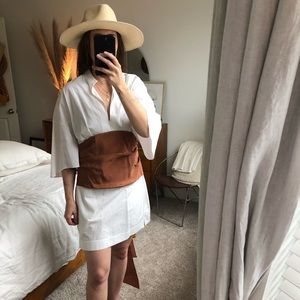Rosie Assoulin white dress with rust colored waist